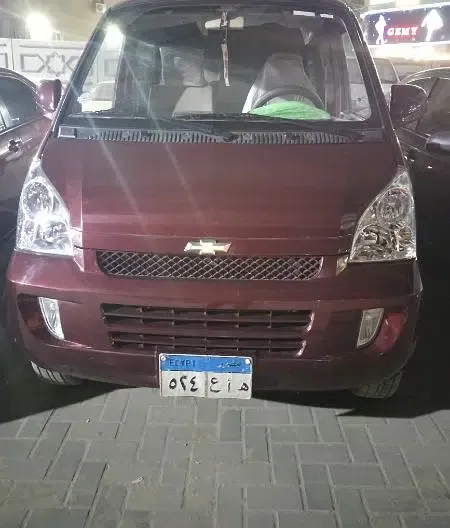 Chevrolet N300 car with driver