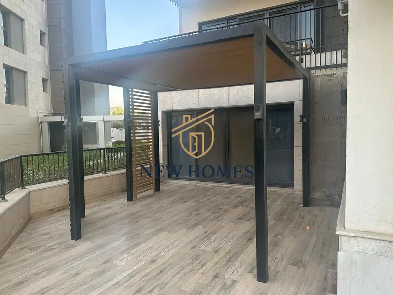 Ground floor apartment with private garden 250sqm for rent in Zed West Compound