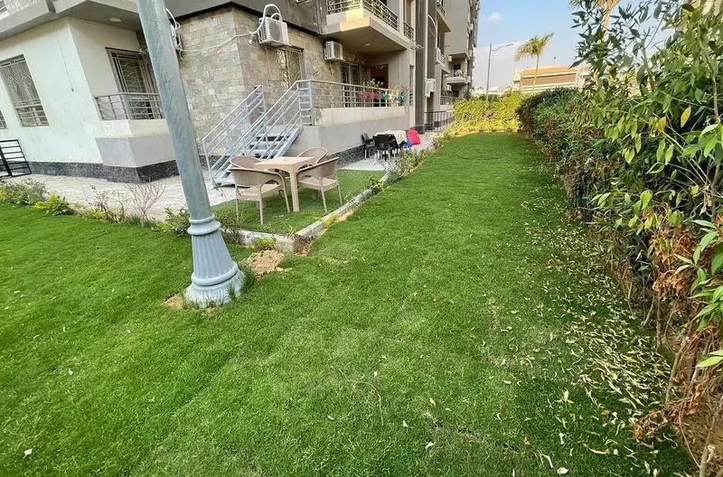 Furnished apartment for rent with a private garden in Compound Janna Zayed 1