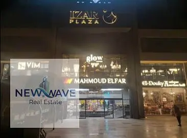Office for rent in a prestigious mall in Sheikh Zayed - Super Lux finishing