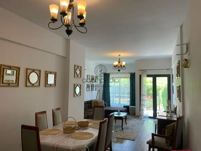 Fully furnished apartment for rent in Al Marasem with a garden
