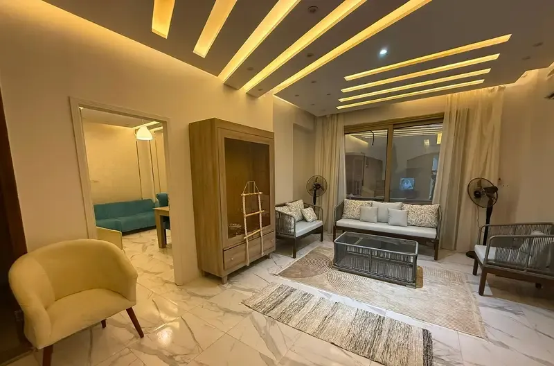 Furnished duplex for rent with a garden in the 16th District, Sheikh Zayed