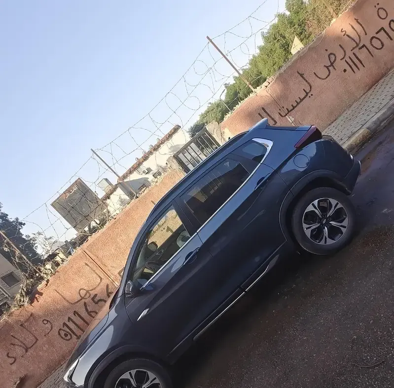 Rent Tiggo 7 SUV car daily with driver