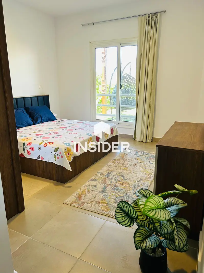 Ground chalet with garden for rent in Amwaj, North Coast, direct on the pool