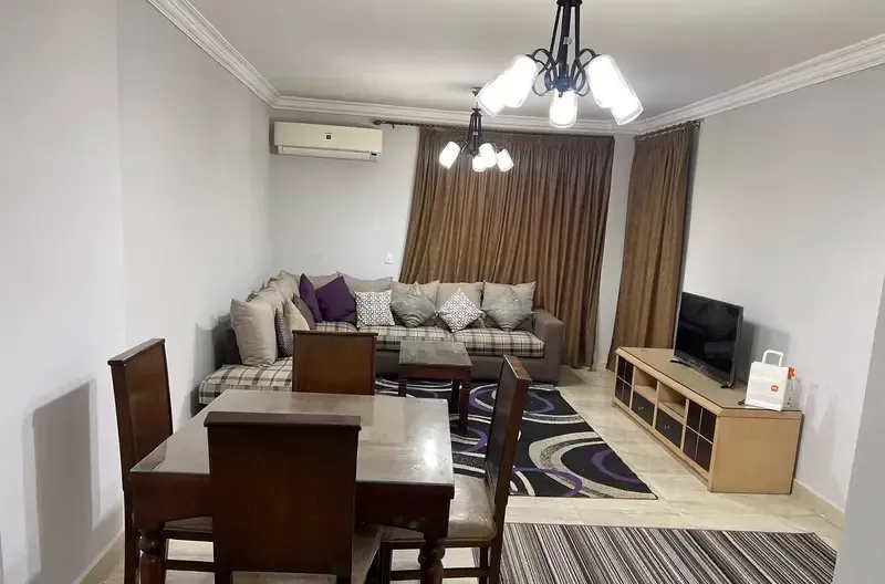 Furnished apartment for rent in Compound Janna Zayed 1 with a private garden