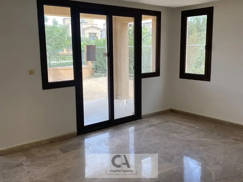 Semi-furnished 5-bedroom villa for rent in Mivida Compound