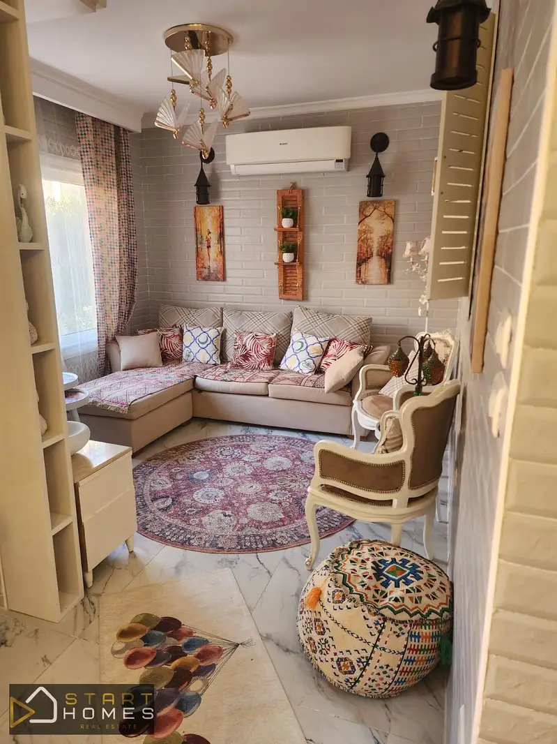Furnished apartment with garden view in Rehab City