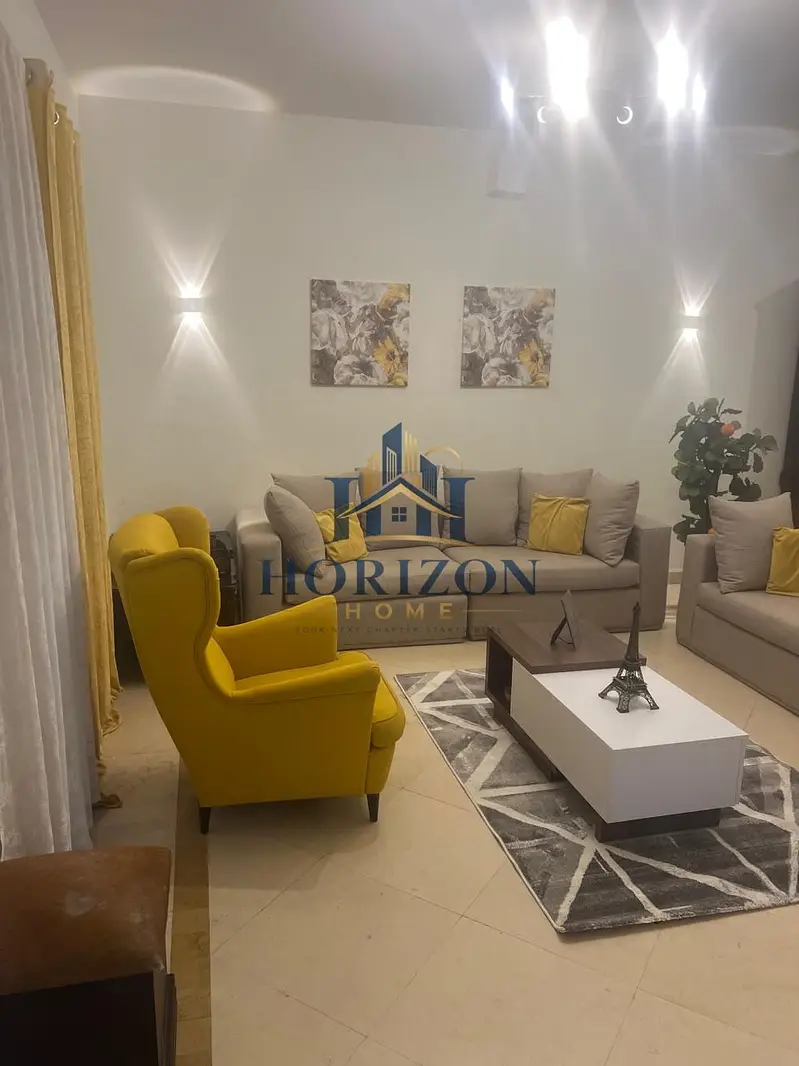 Fully furnished ground floor apartment with a garden for rent in Mivida